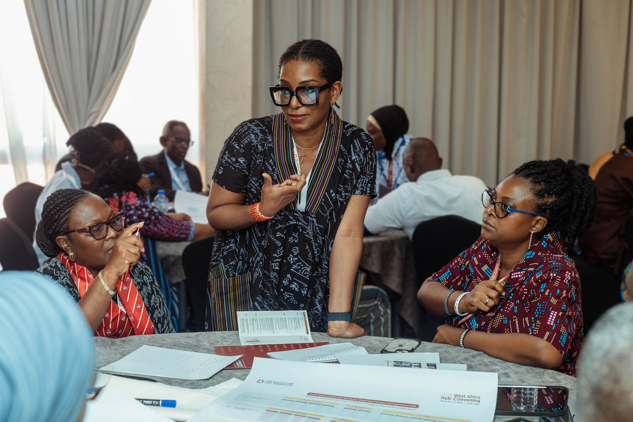 University leaders and faculty collaborating across the network